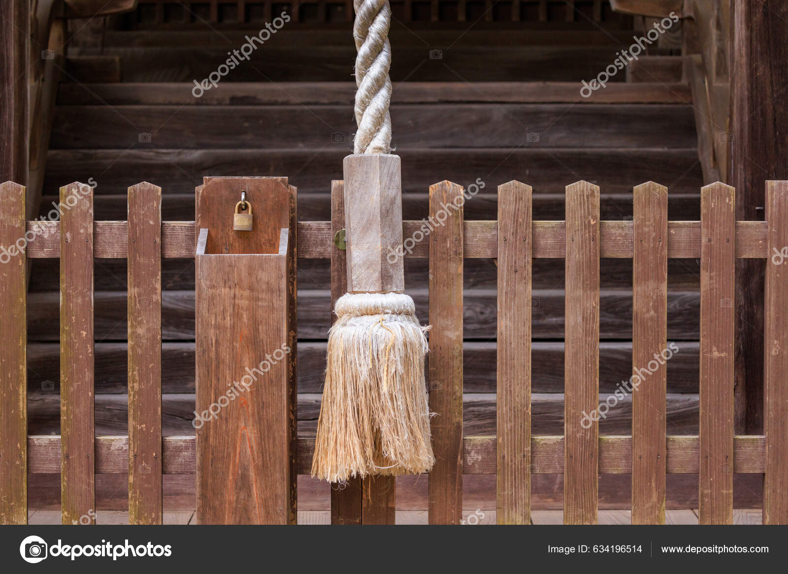 Large Rope Ring Bell Japanese Temple Small Padlock Wooden Fence Stock Photo  by ©osazecuomo@gmail.com 634196514