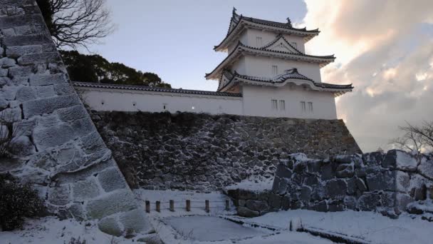 Historic Tower Atop Snow Covered Stone Walls Japanese Castle Winter — Stockvideo