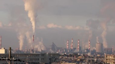 Air Pollution By Smoke And Carbon Emissions From Industrial Plant in Small Town. High quality 4k footage