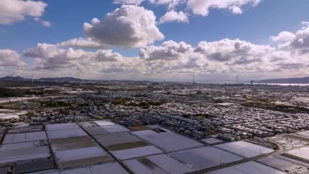 Aerial View Clouds Moving Quickly Snowy Fields Suburb High Quality — Vídeos de Stock