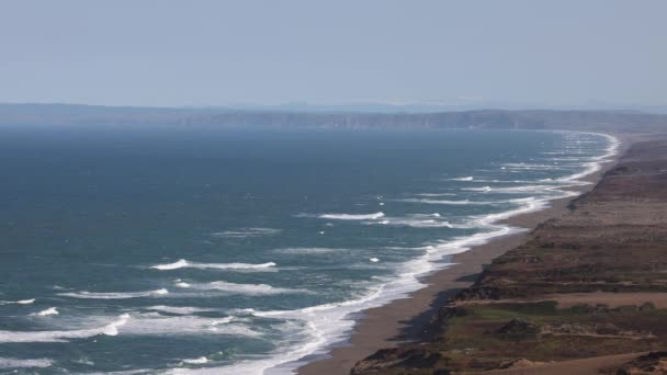 View Waves Long Sandy Beach Rugged Sand Dune Cliffs Sunny — Stock Video