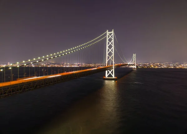 Auto Lichten Wazig Akashi Bridge Met Verre Stad Nachts Hoge — Stockfoto