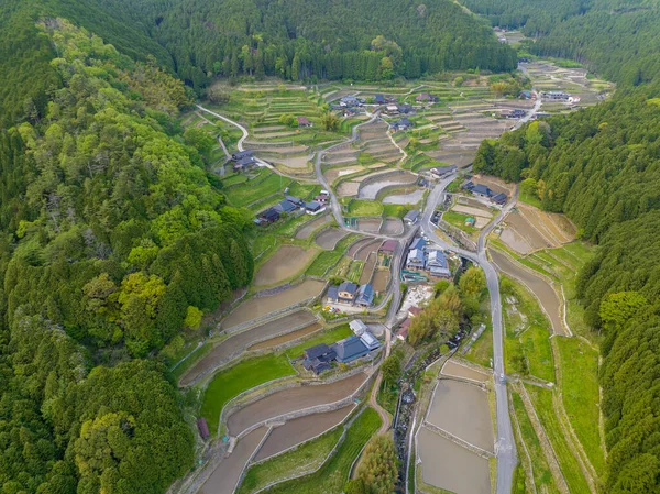 Luftaufnahme Terrassenförmig Angelegter Reisfelder Die Zur Pflanzzeit Einem Abgelegenen Dorf — Stockfoto