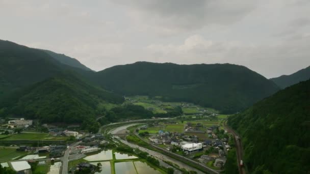 Flying Backwards Flooded Rice Fields Village River Mountains High Quality — Stock Video