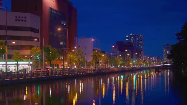 Matsuyama Japan June 2023 Street Lights Reflect Water Office Buildings — Stock Video
