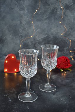 Valentine background with wine, roses and beautiful gifts. 