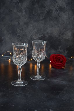 Valentine background with wine, roses and beautiful gift. 