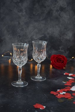 Valentine background with wine, roses and beautiful gift. 