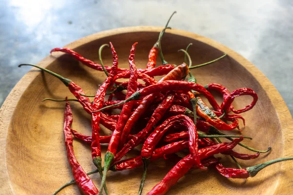 stock image Top angle view of red dried chili in wooden plate