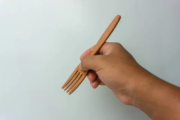 Hand Holding Wooden Fork Isolated White Background — Stock Photo, Image
