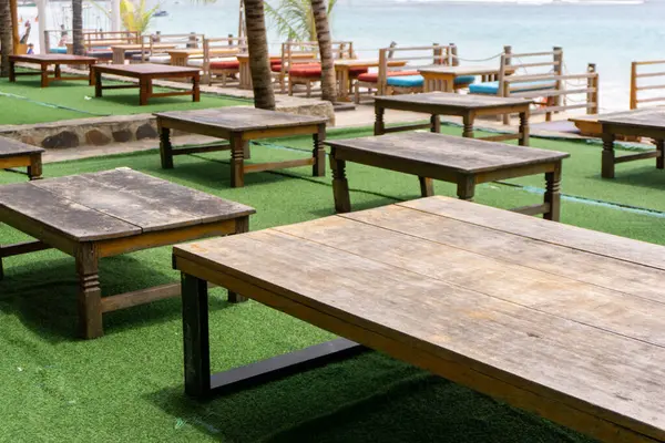 stock image Empty tables at the beachside cafe in Aceh Besar, Indonesia. Beachside restaurant.