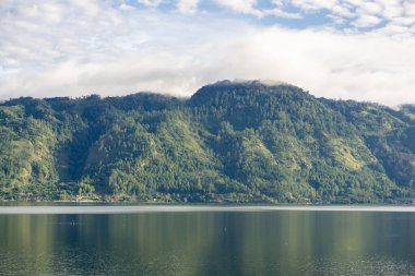 Landscape of Laut Tawar lake in Takengon city, Indonesia. Popular tourist destination in Central Aceh. clipart