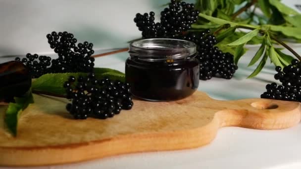 Tincture Red Berries Medical Jar Elderberry Juice Wooden Board Black — Stock Video