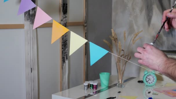 Creative Studio Handmade Holiday Decorations Person Glues Paper Triangles Thread — Stock Video