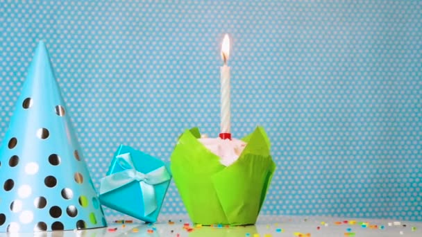 Close Blue Festive Muffin Burning Candle Blue Background Happy Birthday — Stock Video