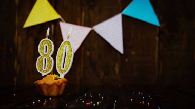 Beautiful anniversary background happy birthday with a golden number in a cake. Decoration background for a birthday with a number 80