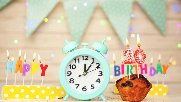 Happy birthday greeting card with muffin pie and retro clock on clock hands new birth. Beautiful background with decorations festive happy birthday decoration with number 20