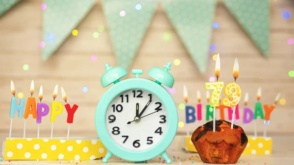Happy birthday greeting card with muffin pie and retro clock on clock hands new birth. Beautiful background with decorations festive happy birthday decoration with number 79