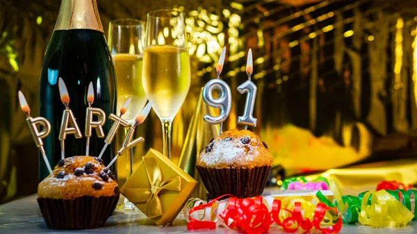 Happy birthday background with champagne glasses with number cake  91. Beautiful birthday card with decorations copy space.