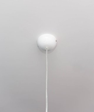 Plafond white for ceiling chandelier. Protective cap for an electric cord for a ceiling chandelier.