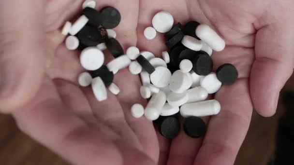 Top View Avitaminosis Medicine Pills Black Hand Man Flaky Skin — Stockvideo