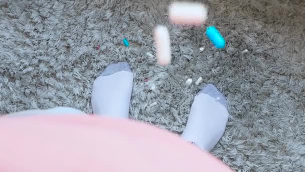 Medical Pills Falling Floor Person Legs Fluffy Rug Pills Capsules — ストック動画