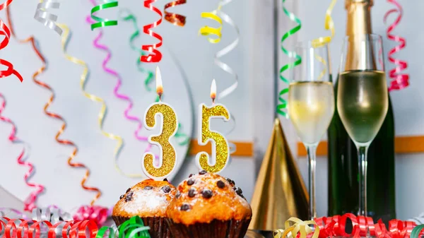 stock image Solemn cake for an anniversary with a number  35. Happy birthday background with champagne bottle and champagne glasses. Beautiful holiday decorations copy space.