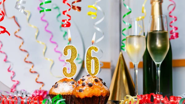 stock image Solemn cake for an anniversary with a number  36. Happy birthday background with champagne bottle and champagne glasses. Beautiful holiday decorations copy space.