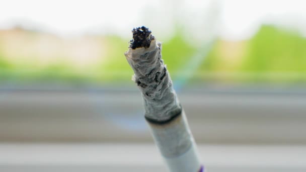 Cigarette Smokes Window Smoking Cigarette Macro Shot Gray Bokeh Background — Stock Video