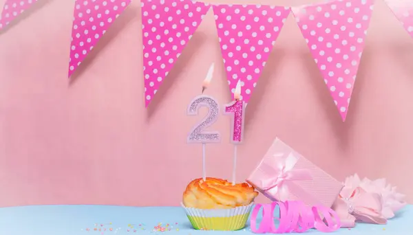 Date of Birth  21. Greeting card in pink shades. Anniversary candle numbers. Happy birthday girl, polka dot garland decoration. Copy space.