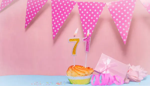 Date of Birth  71. Greeting card in pink shades. Anniversary candle numbers. Happy birthday girl, polka dot garland decoration. Copy space.