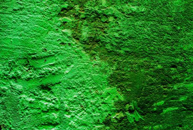 Neon yeşil duvar, antika duvar arkaplanı, yazı için doku. Korkunç bir geçmişi var. Uzayı kopyala Duvarı kaşı yaratıcı.