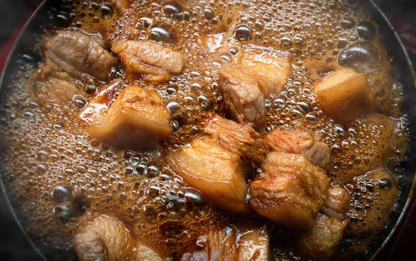 Stewed pork cubes and pork belly in awamori, soy, dashi broth, and sugar are typical of Japanese cuisine.