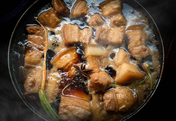 Stewed pork cubes and pork belly in awamori, soy, dashi broth, and sugar are typical of Japanese cuisine.