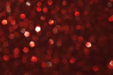 Zarif ve soyut koyu kırmızı parlak bokeh arkaplan. Mevsimsel ışık dekoratif soyut tasarım ögesi.