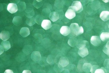 Zarif ve soyut yeşil parlak bokeh arkaplan. Mevsimsel ışık dekoratif soyut tasarım ögesi.