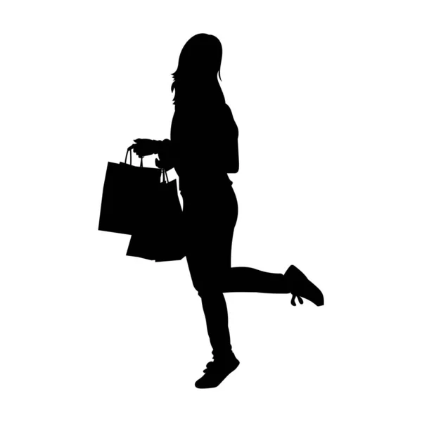 買い物袋を持ったスリムな若い女性のシルエット 流行の女性買い物客のシルエットは — ストックベクタ