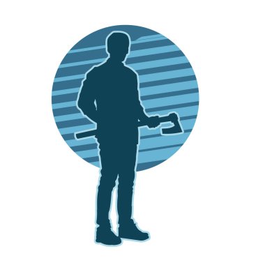 Geniş bir balta tutan bir erkeğin silueti. Elinde baltayla bir oduncunun silueti..