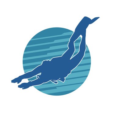 Tüple dalış yapan bir erkeğin silueti.