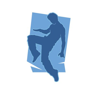 Enerjik dansçı pozunun silueti. Dinamik pozisyondaki bir erkek dansçının silüeti..