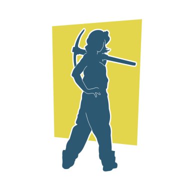 Kazma aletleri taşıyan işçi kostümlü bir kadının silüeti. Toplama aleti ile poz veren kadın silueti..