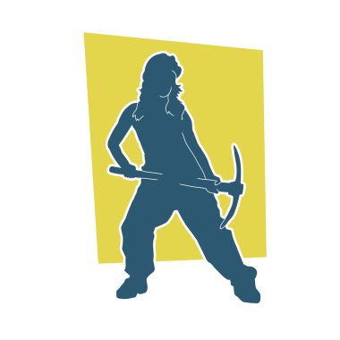 Kazma aletleri taşıyan işçi kostümlü bir kadının silüeti. Toplama aleti ile poz veren kadın silueti..