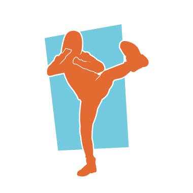 Tekme atan bir kadın dövüş sanatının silueti. Hareket halindeki bir kadın dövüşçünün silueti..