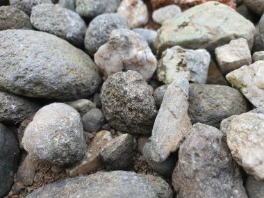 Doğal arkaplan için taş çakıl taşlarının fotoğrafını kapat.