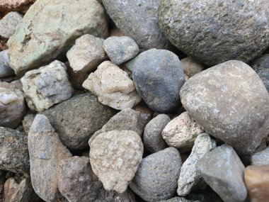 Doğal arkaplan için taş çakıl taşlarının fotoğrafını kapat.