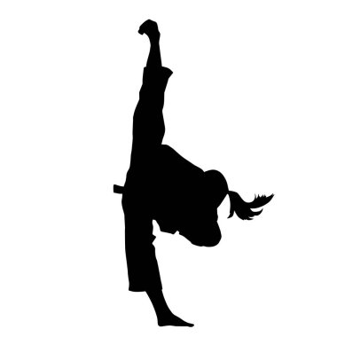 Tekmeleyen bir kadının silueti. Hareket halindeki bir kadın dövüş sanatının silüeti..