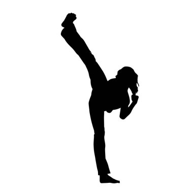 Tekmeleyen bir kadının silueti. Hareket halindeki bir kadın dövüş sanatının silüeti..