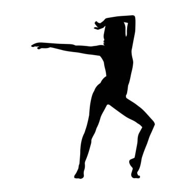 Poz vermiş bir balerin kadın silueti. Hareket halindeki bir balerin silueti..