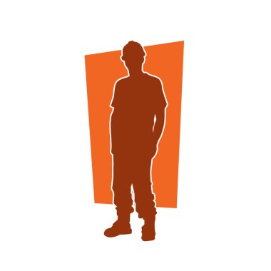 İnşaat işçisi kostümlü bir adamın silueti. İnşaat işçisinin silueti pozda.. 
