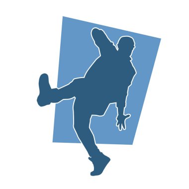 Poz veren bir erkek dansçının silueti. Dans eden bir adamın silueti.